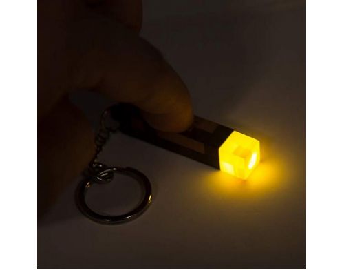 Фото №2 - Брелок JINX Minecraft - 3D Light-Up Torch Keychain