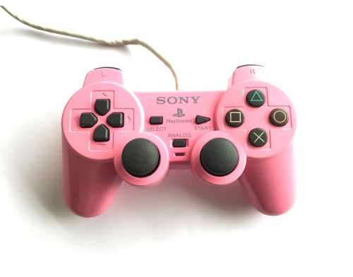 Фото №1 - Джойстик проводной DualShock Sony PlayStation 2 Pink Б.У.